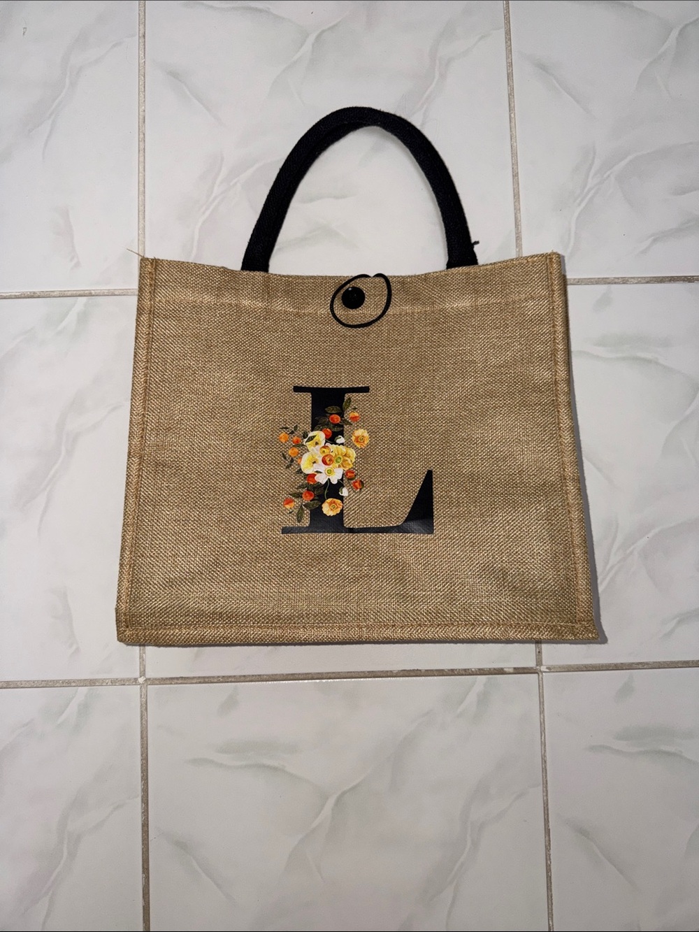 Neutral Burlap Tote Bag with Floral 'L' Accent - Black Handles